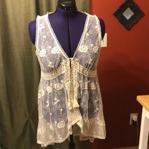 Maurice’s lace vest.